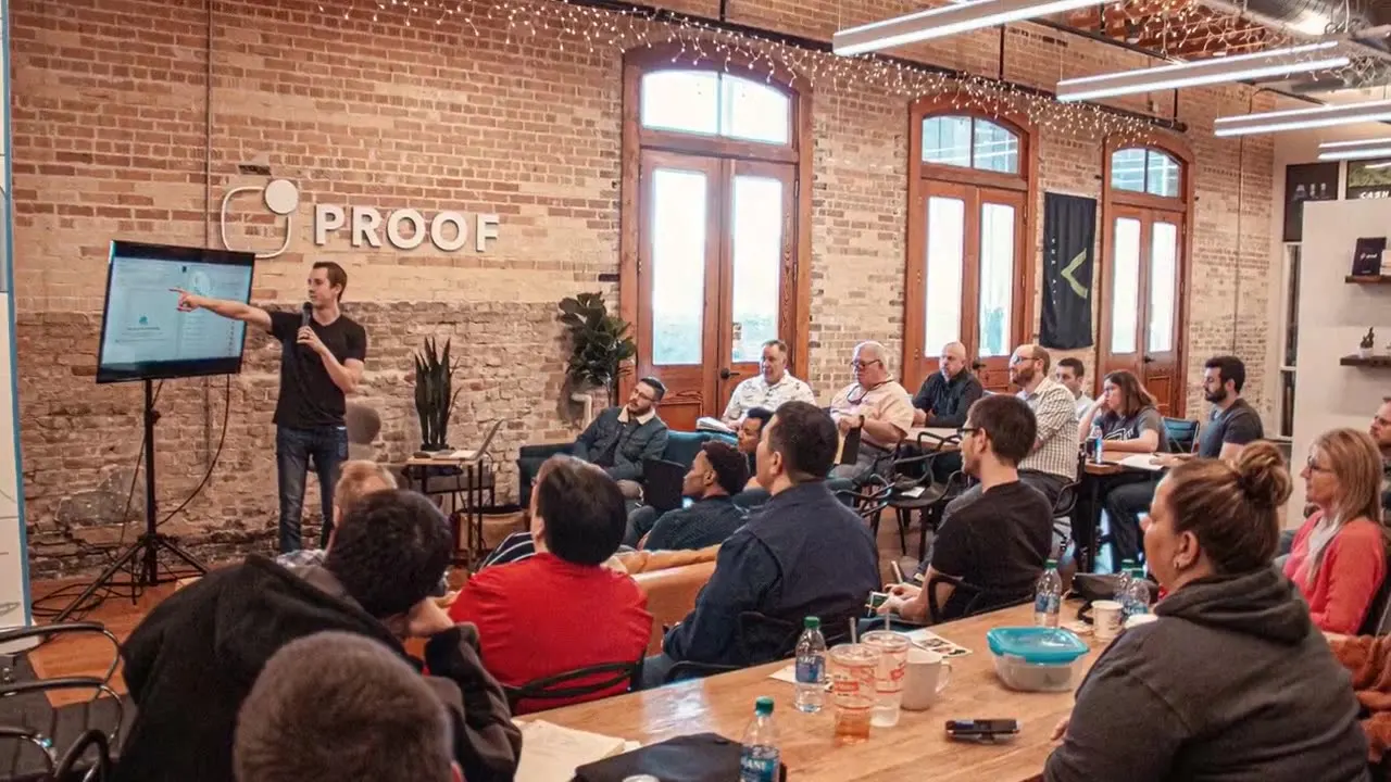 Speaker in a brick-walled seminar hall